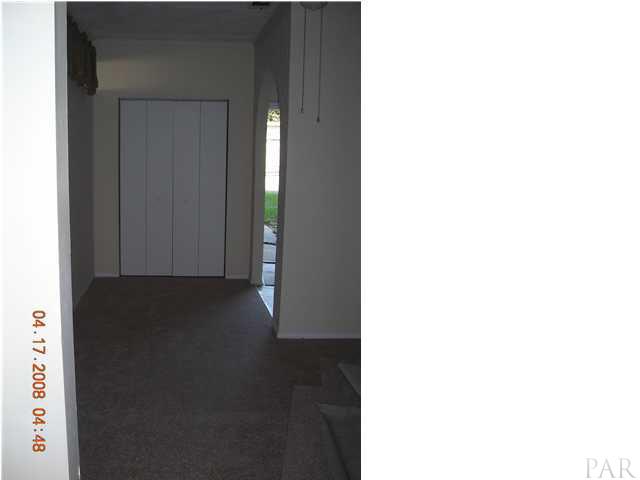 224 Alton Road Pensacola, FL 32507 - Photo 8 of 14 VIEW ACROSS MASTER BEDROOM TOWARD CLOSET (BEDROOM #3)