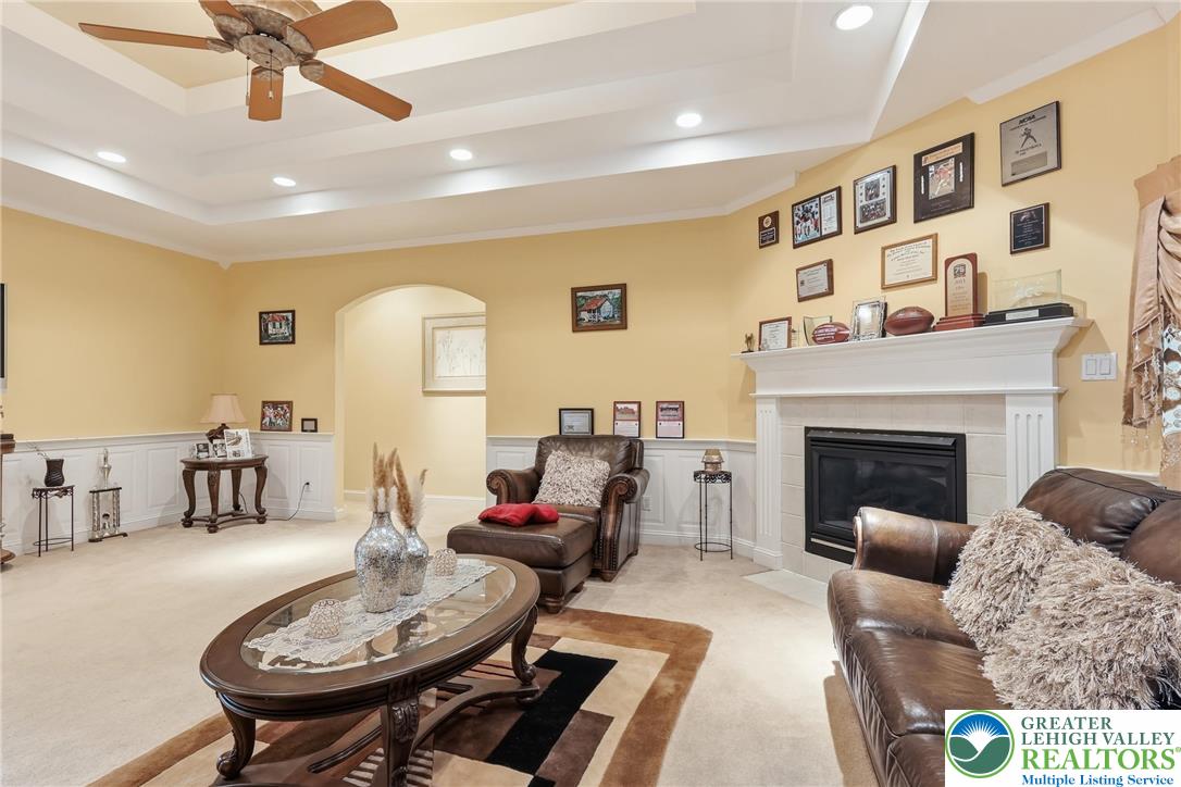 5217 Cider Press Road Schnecksville, PA 18078 - Photo 10 of 54 a living room with furniture and a fireplace