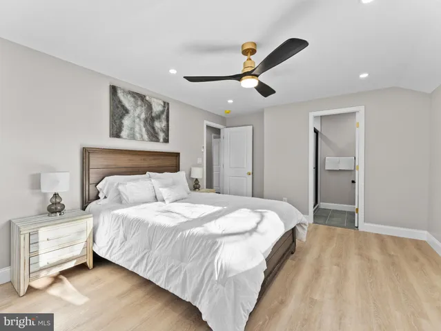 a bathroom with a shower and a sink