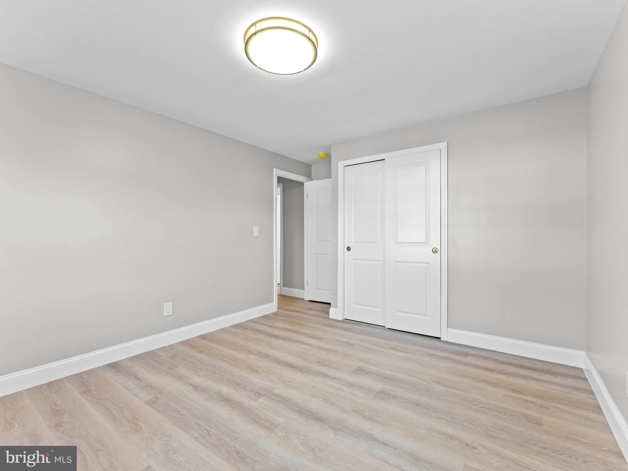 1202 Woodruff Road Glassboro, NJ 08028 - Photo 17 of 28 a view of room with wooden floor