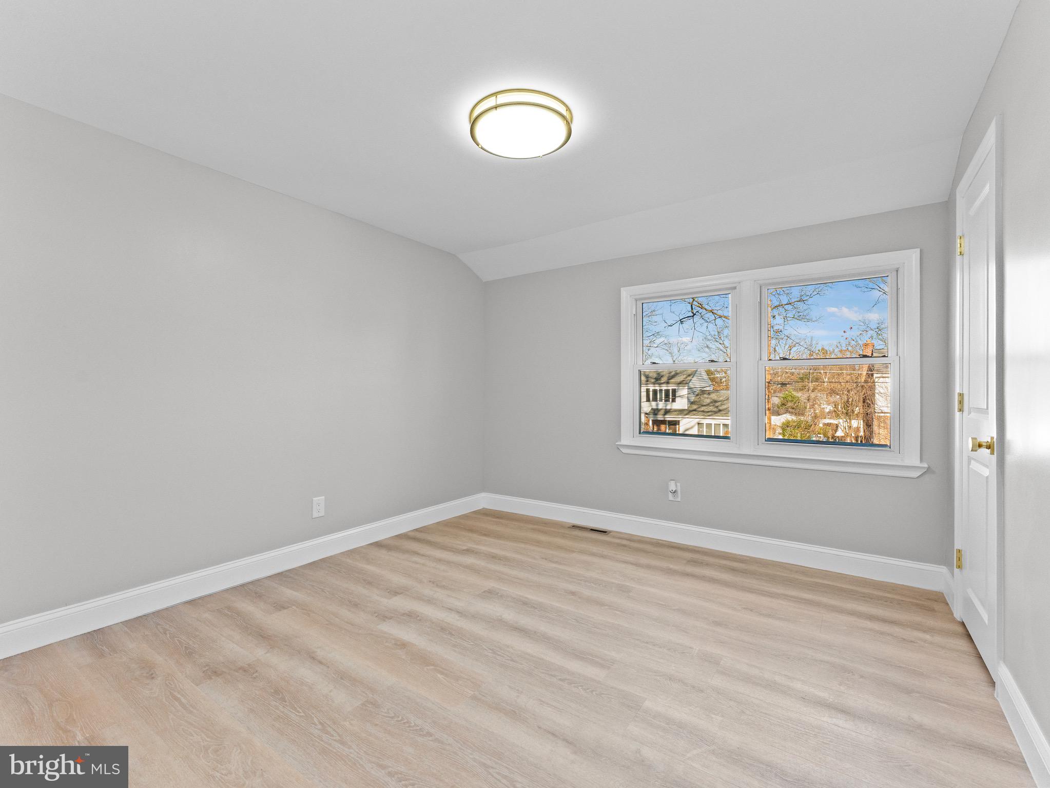 1202 Woodruff Road Glassboro, NJ 08028 - Photo 18 of 28 a view of an empty room with a window