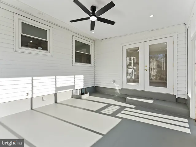 a view of yard with swimming pool and tree