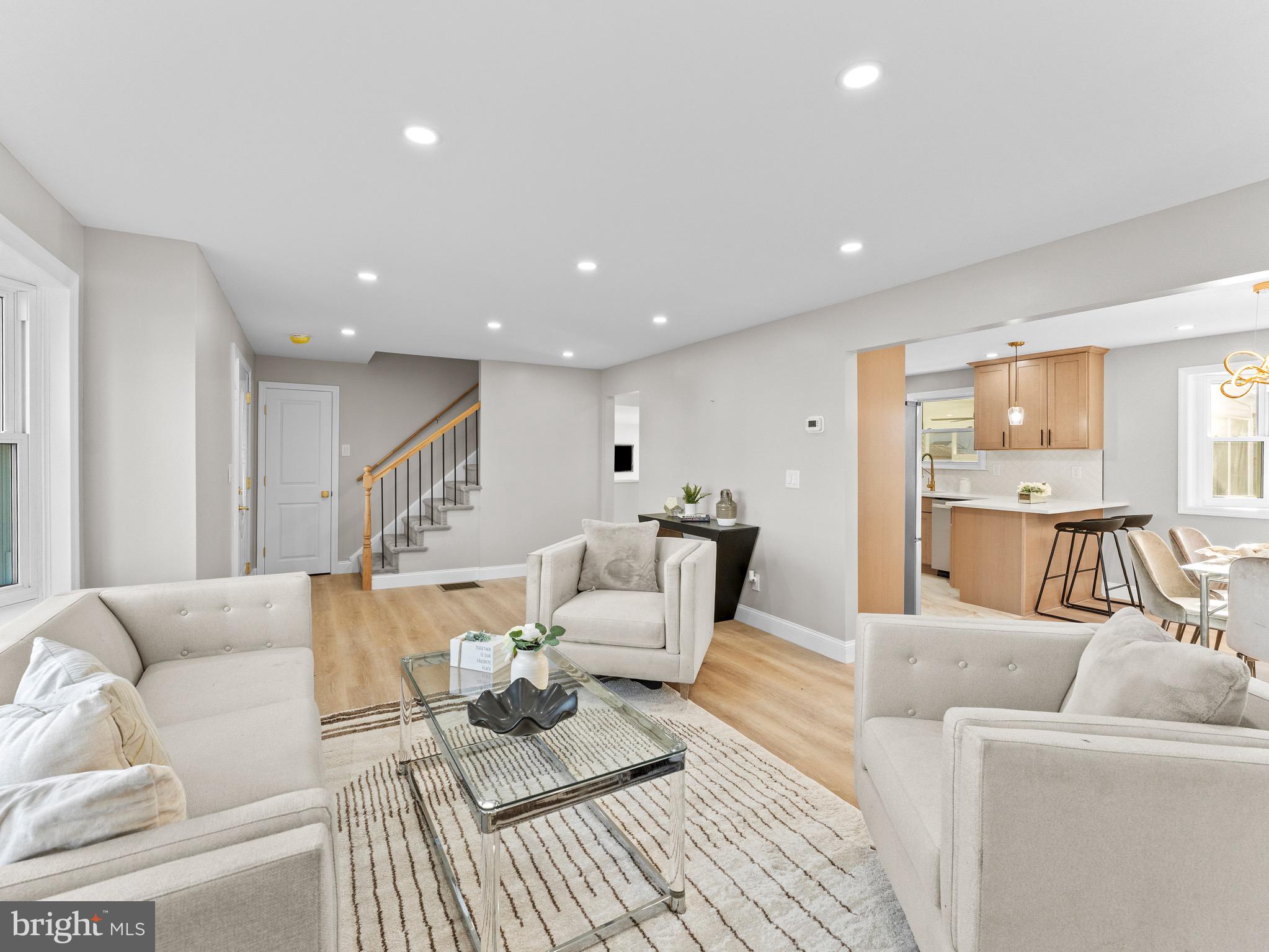 1202 Woodruff Road Glassboro, NJ 08028 - Photo 4 of 28 a living room with furniture and a table