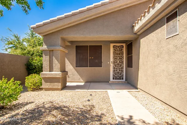 a view of a house with a patio