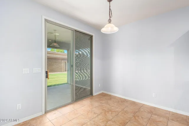 a view of a room with floor to ceiling window