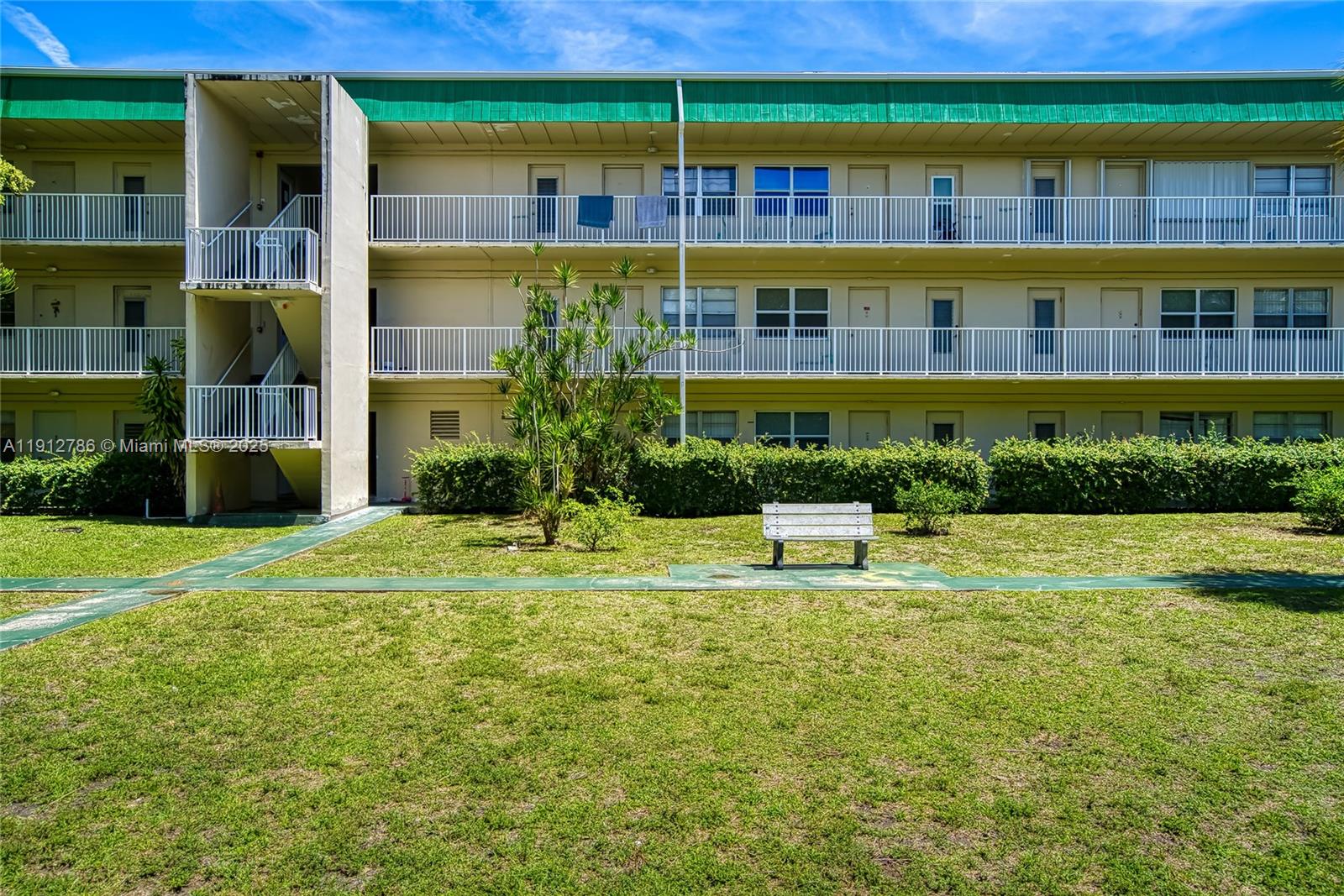 1420 Atlantic Shores Boulevard, Unit 340 Hallandale Beach, FL 33009 - Photo 22 of 33 a house view with a garden space