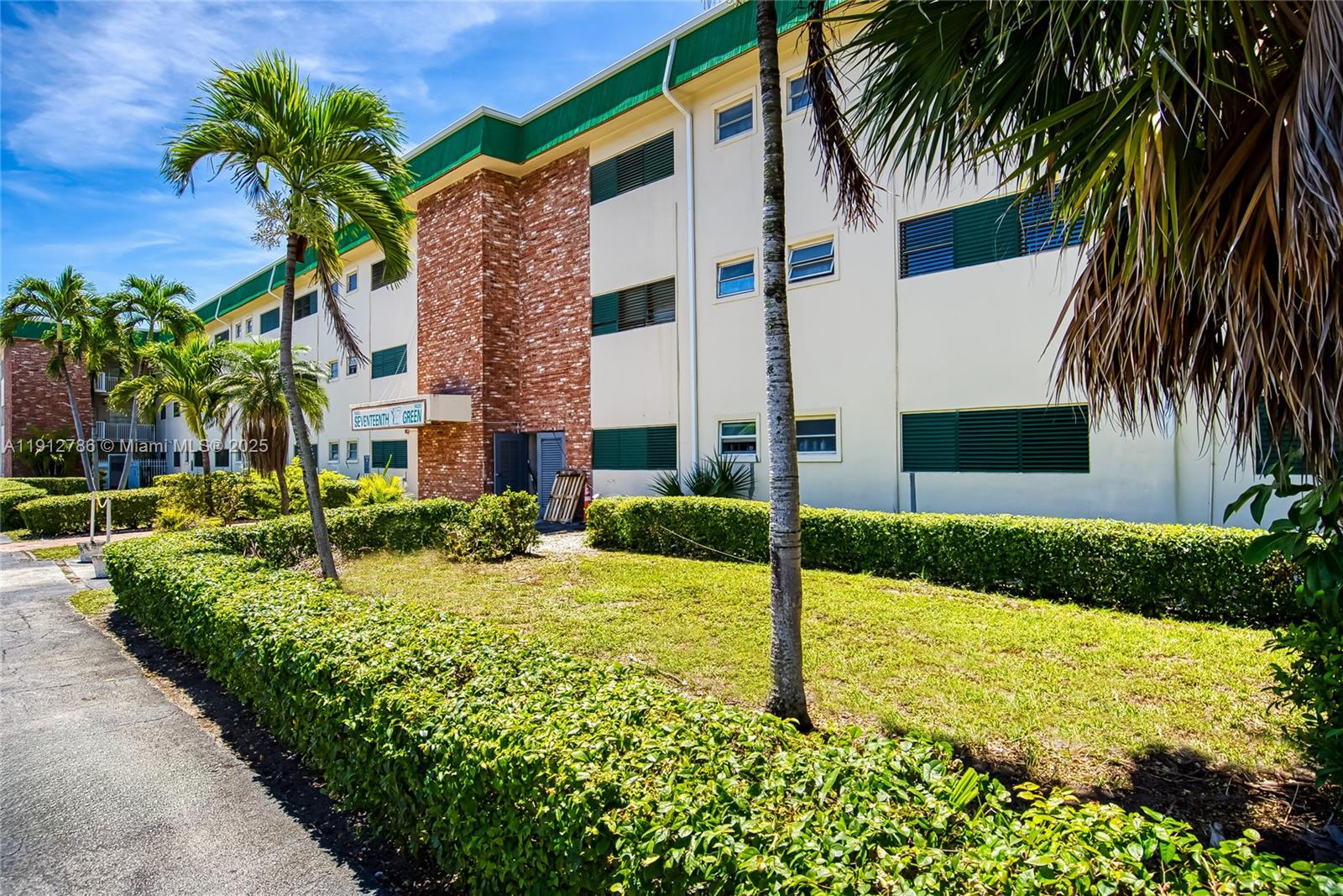 1420 Atlantic Shores Boulevard, Unit 340 Hallandale Beach, FL 33009 - Photo 23 of 33 a front view of house with yard and green space