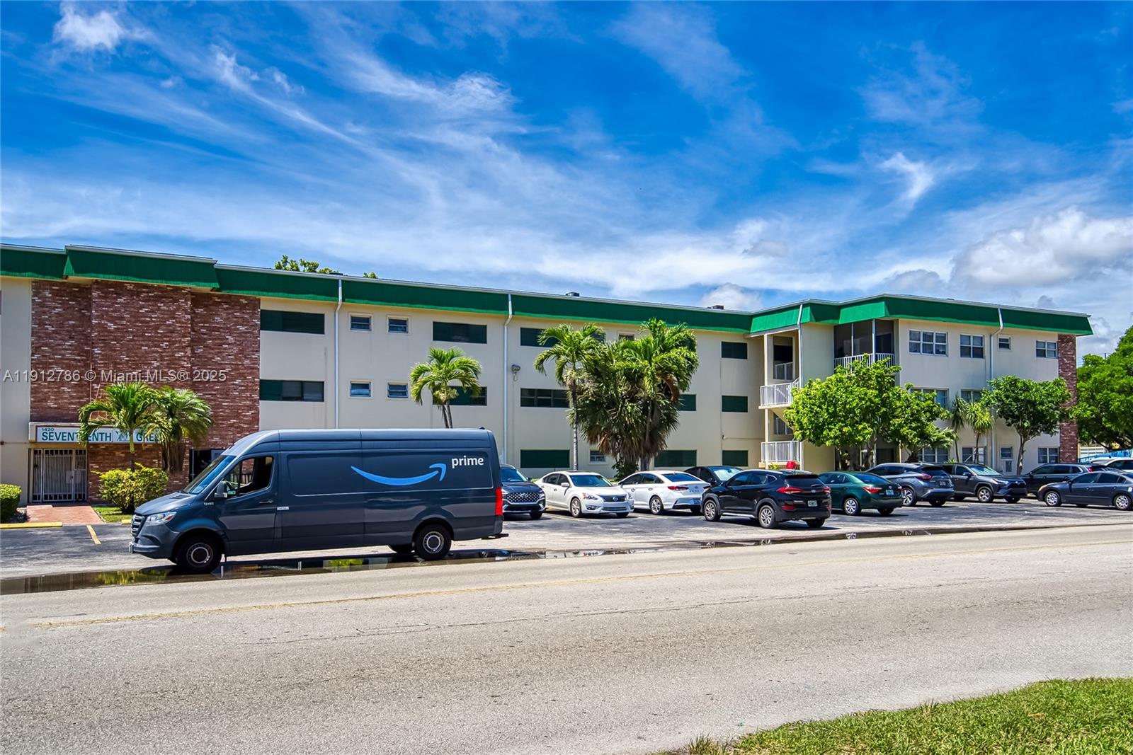 1420 Atlantic Shores Boulevard, Unit 340 Hallandale Beach, FL 33009 - Photo 26 of 33 a car parked in front of a building