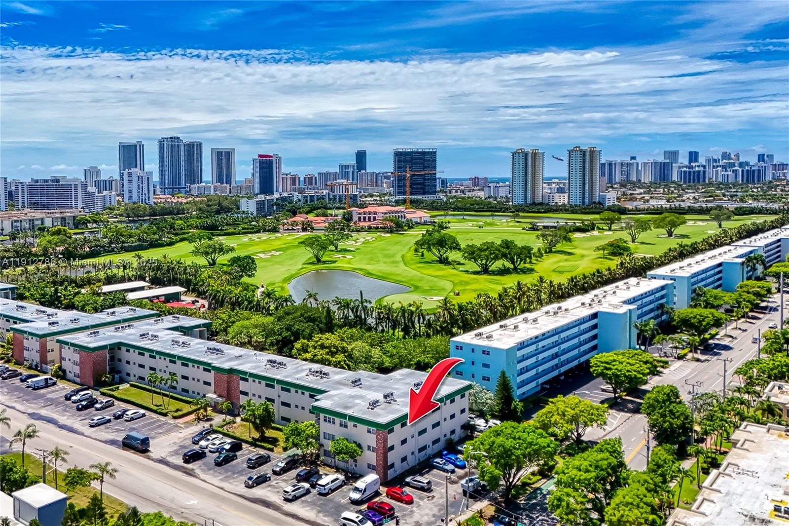 1420 Atlantic Shores Boulevard, Unit 340 Hallandale Beach, FL 33009 - Photo 28 of 33 a view of a garden with an outdoor seating