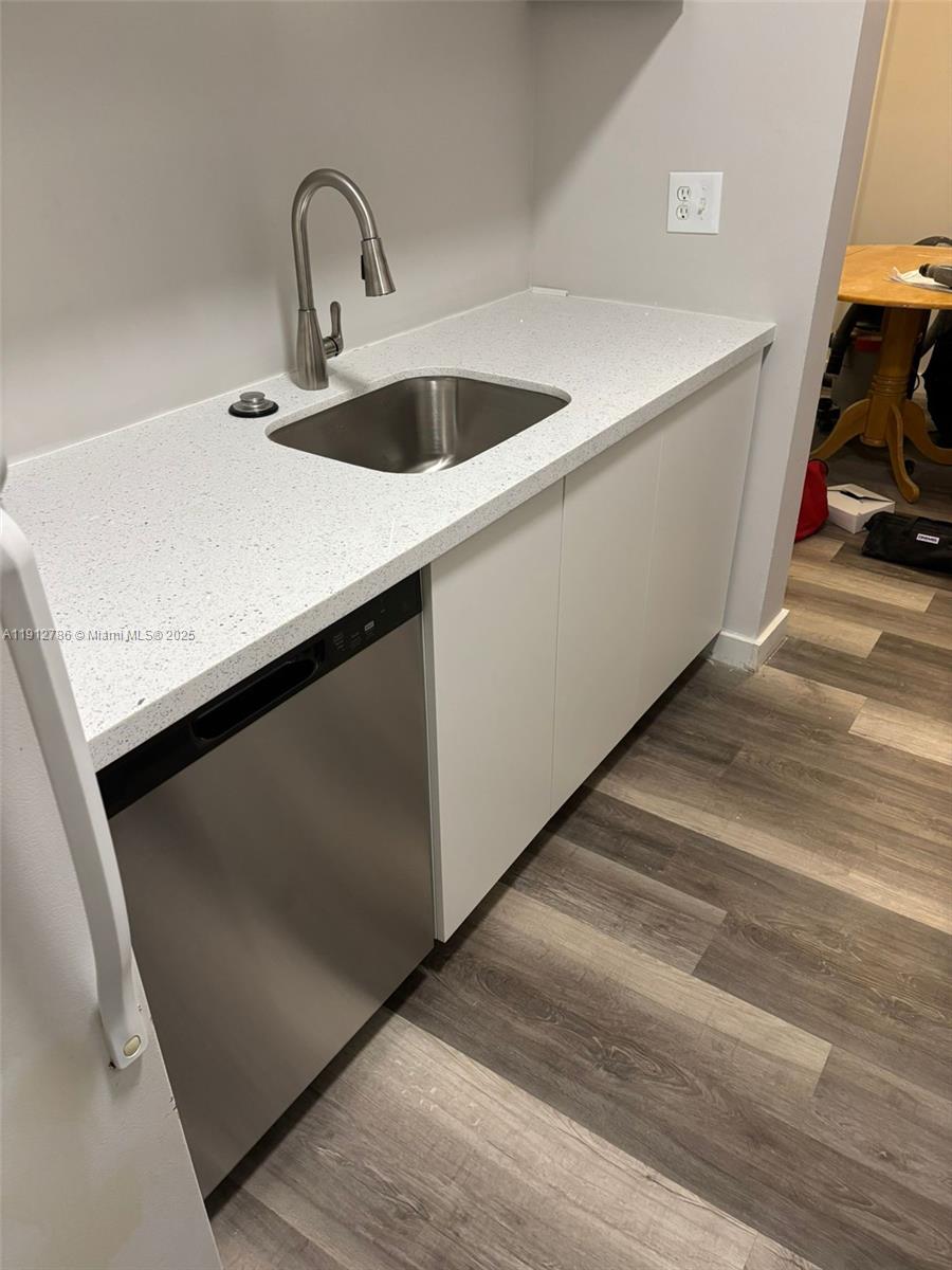 1420 Atlantic Shores Boulevard, Unit 340 Hallandale Beach, FL 33009 - Photo 6 of 33 a close view of sink and tap