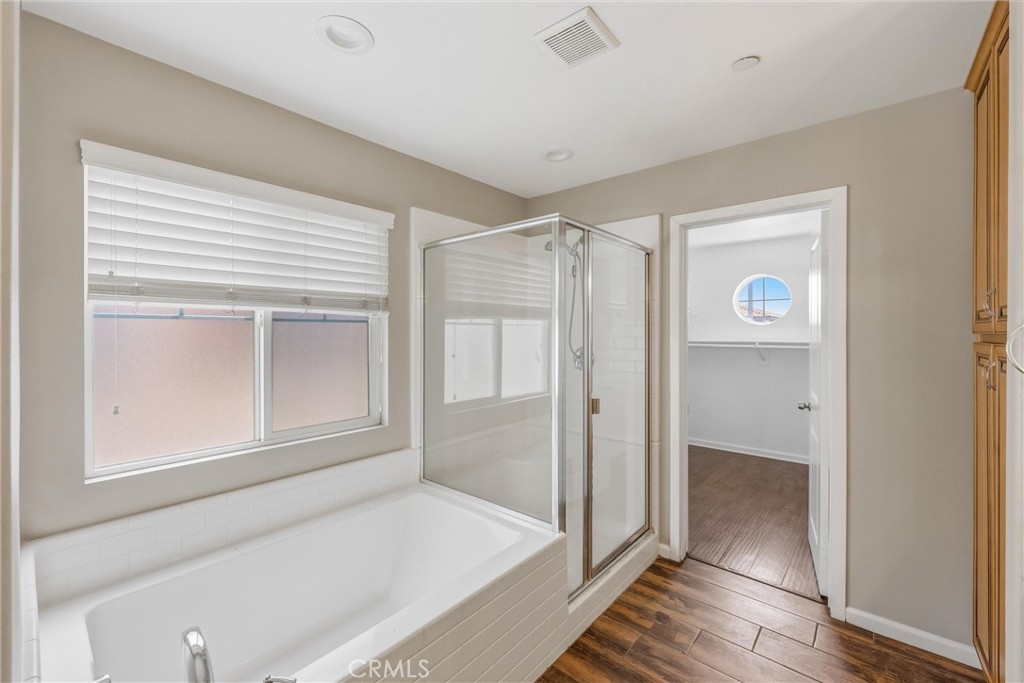 956 West Tibbot Street Rialto, CA 92377 - Photo 28 of 37 a bathroom with a bathtub and a shower