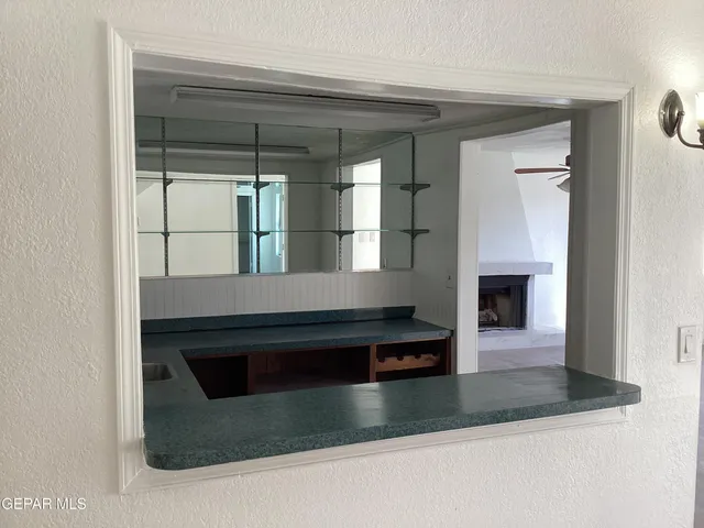 a kitchen with a stove and a microwave