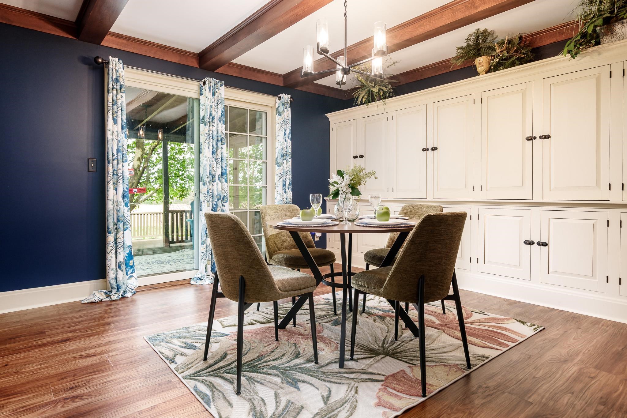 10562 Town Hall Road Belvidere, IL 61008 - Photo 22 of 72 a view of a dining room with furniture window and wooden floor