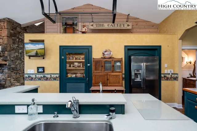 a room with table and chairs