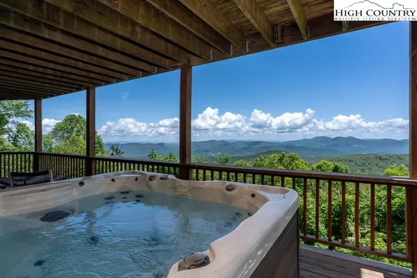 a view of balcony with a swimming pool