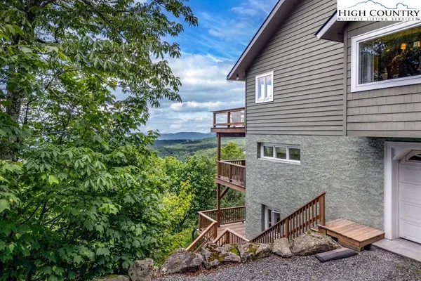 a backyard of a house with seating space