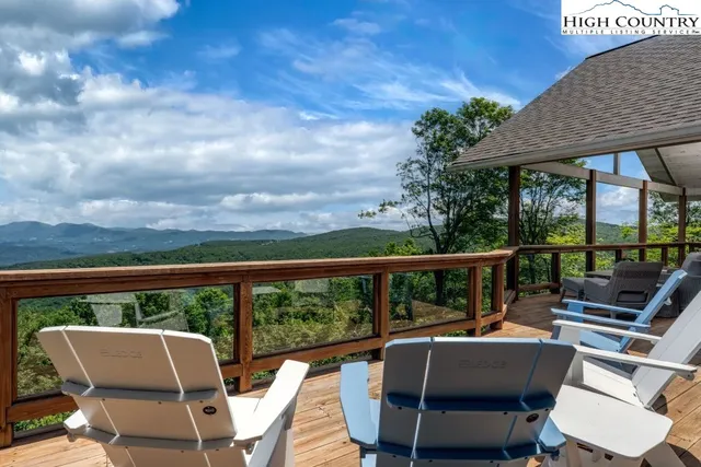 a view of roof deck with patio