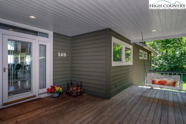 a backyard of a house with seating space