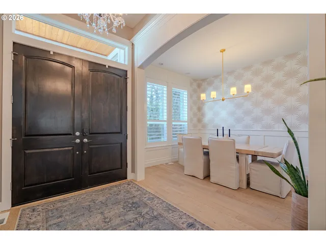 a room with furniture and a chandelier