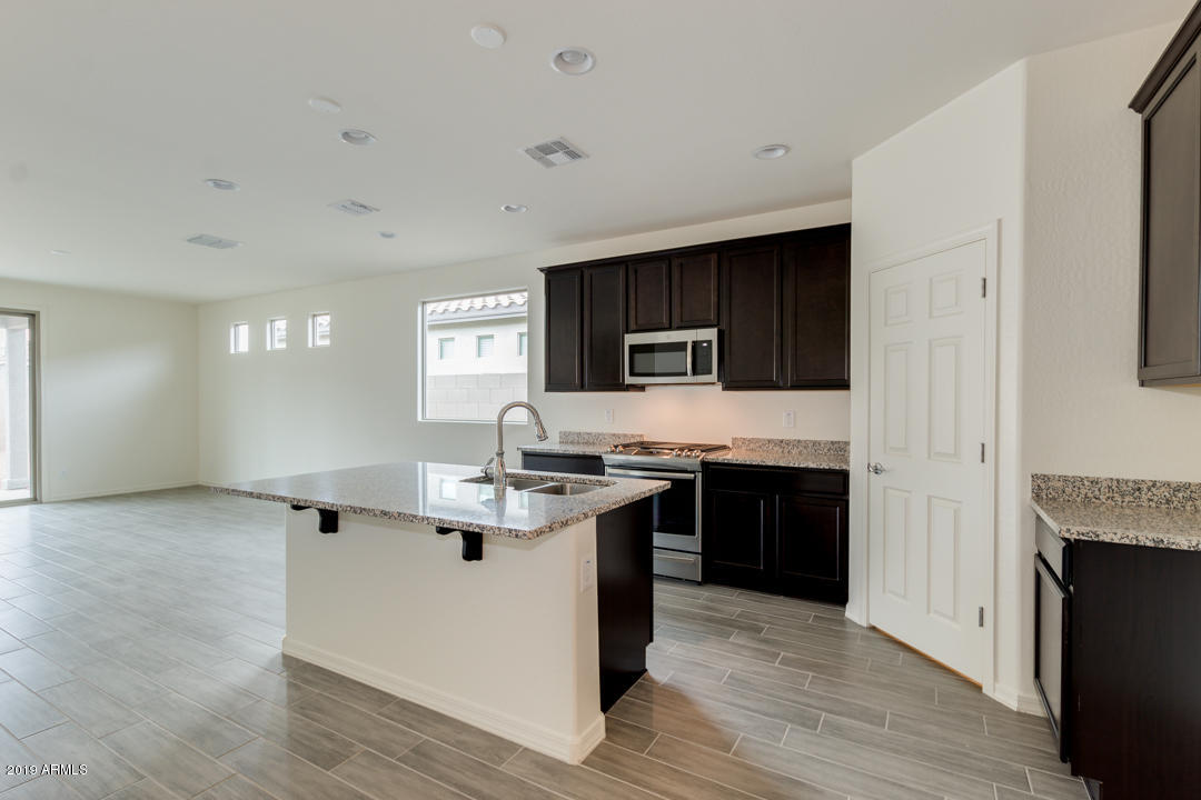 3247 West Carter Road Phoenix, AZ 85041 - Photo 5 of 32 Your New Home (5)