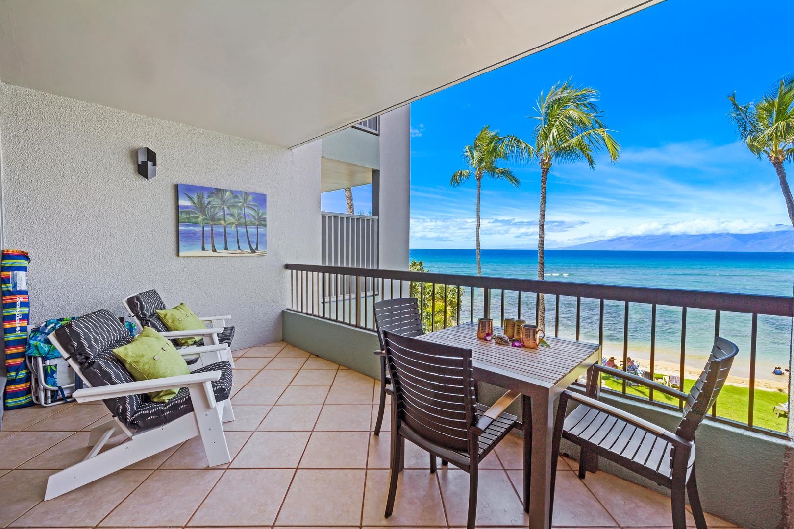 3875 Lower Honoapiilani Road, Unit B305 Lahaina, HI 96761 - Photo 11 of 35 a balcony with furniture