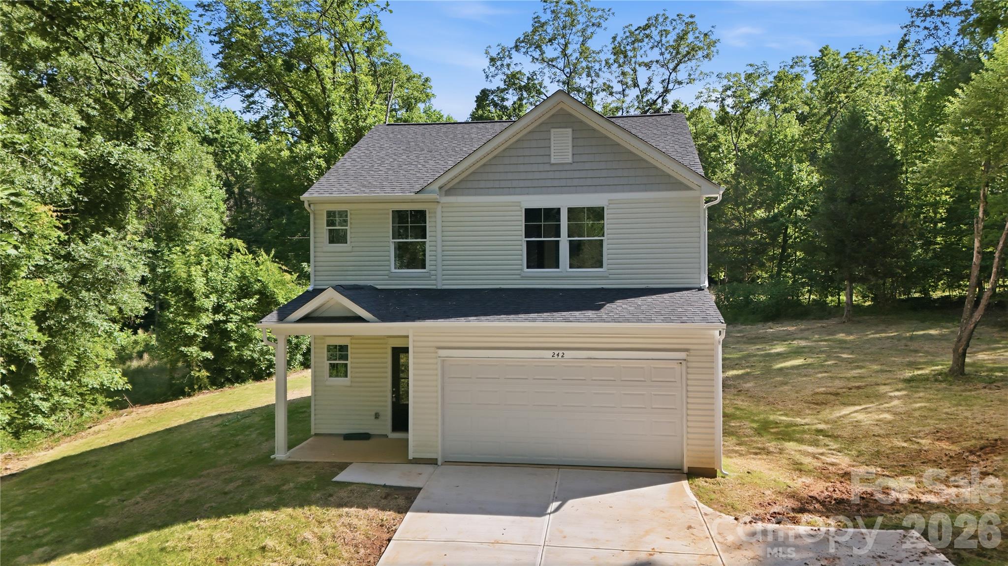 242 Landers Chapel Road Lincolnton, NC 28092 - Photo 1 of 33 a front view of a house with a yard