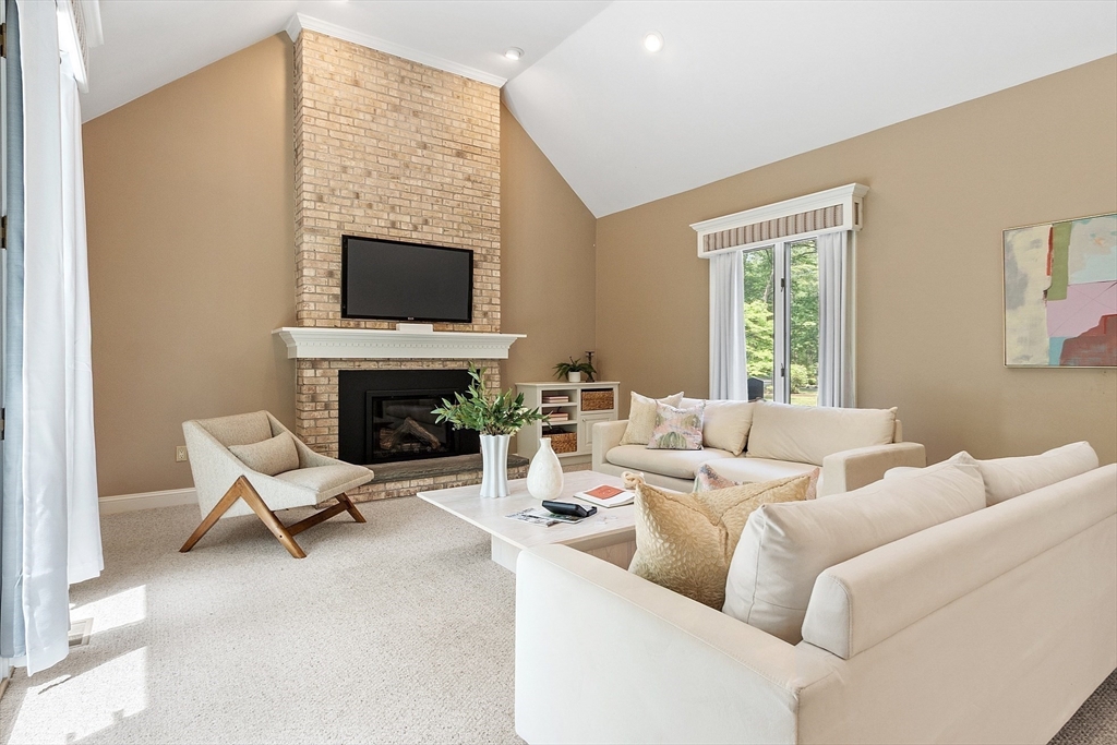 151 Pope Road Acton, MA 01720 - Photo 17 of 34 a living room with furniture or fireplace and a flat screen tv