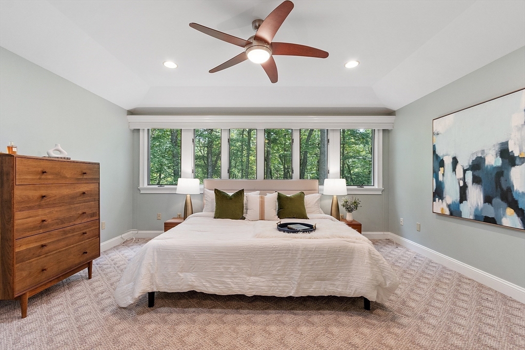 151 Pope Road Acton, MA 01720 - Photo 19 of 34 a bedroom with a bed and a large window