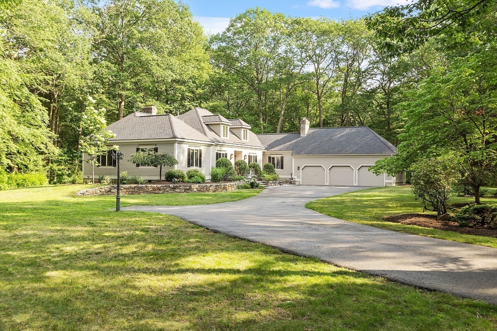 151 Pope Road Acton, MA 01720 - Photo 2 of 34 a house with swimming pool in front of it