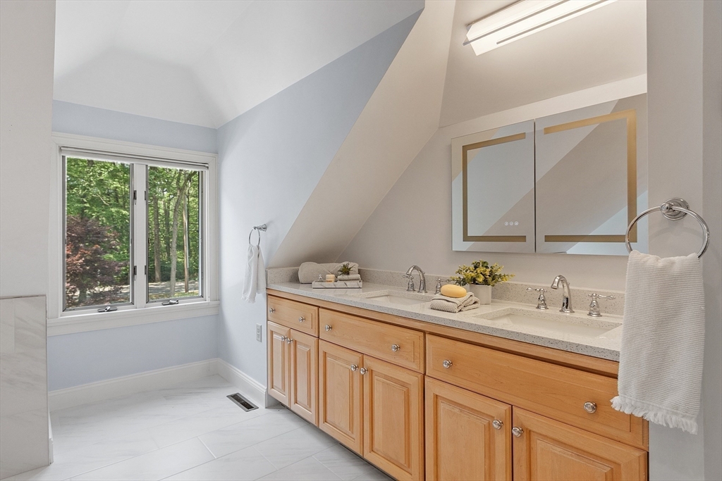 151 Pope Road Acton, MA 01720 - Photo 24 of 34 a en suite bathroom with a granite countertop sink and a window