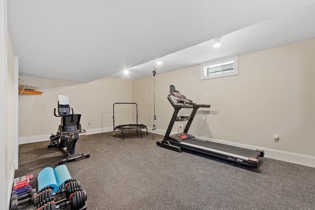 151 Pope Road Acton, MA 01720 - Photo 31 of 34 a view of a room with gym equipment