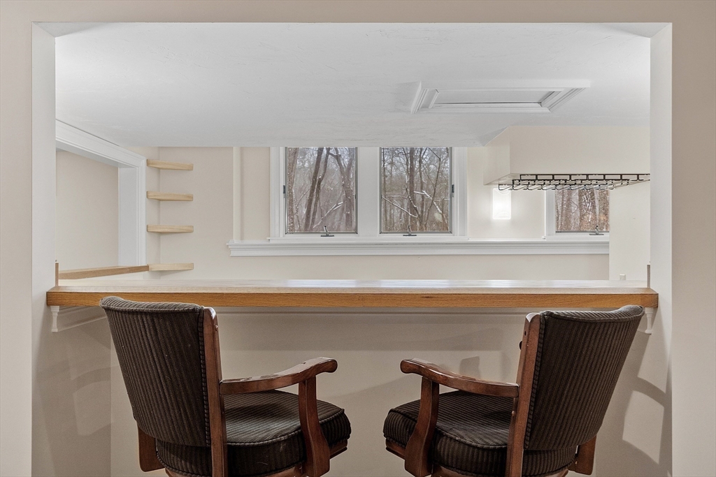 151 Pope Road Acton, MA 01720 - Photo 32 of 34 a view of a chair and table in a room