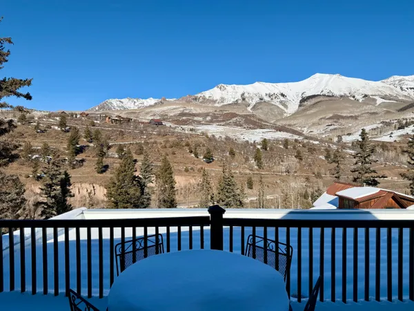 a view of a balcony with an ocean view