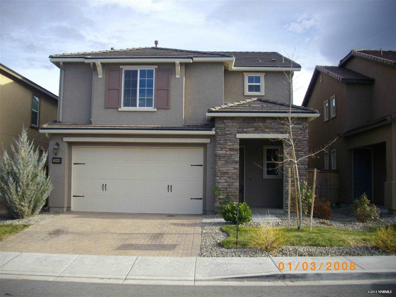 2040 Black Sand Drive Reno, NV 89521 - Photo 1 of 1 a front view of a house with garden