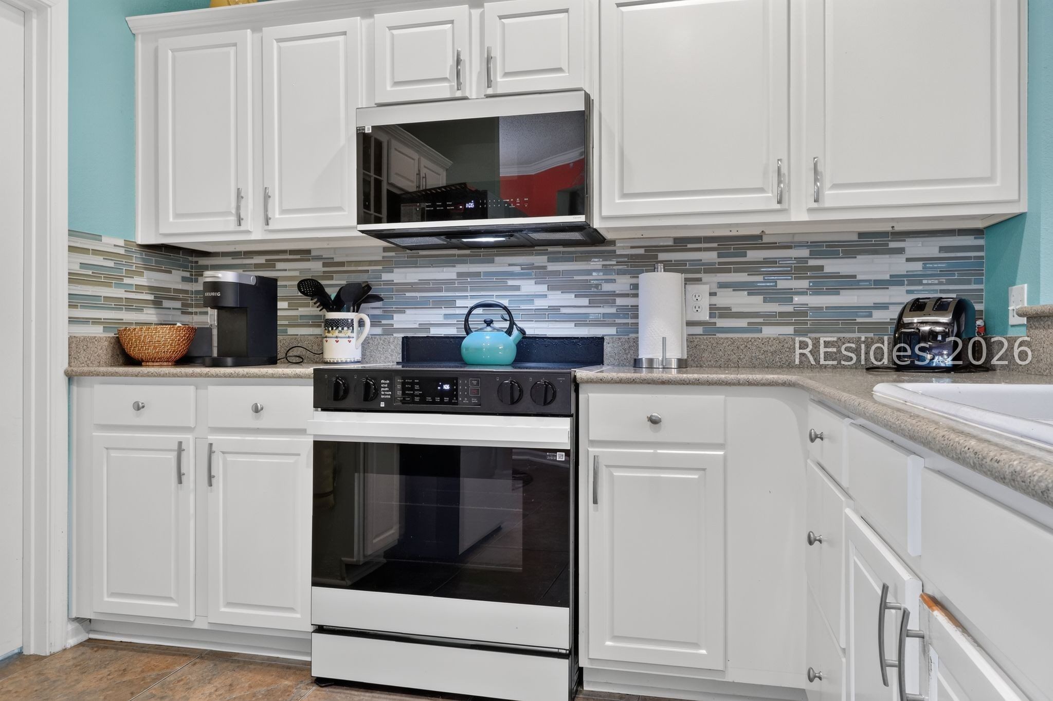 112 Holly Ribbons Circle Bluffton, SC 29909 - Photo 8 of 36 Silestone Counters with tiled backsplash