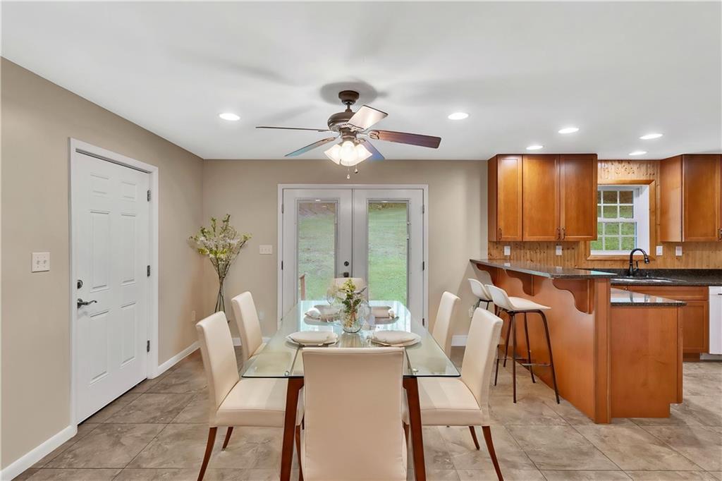 164 Crooks School Road Clinton, PA 15026 - Photo 11 of 38 Virtually staged dining area