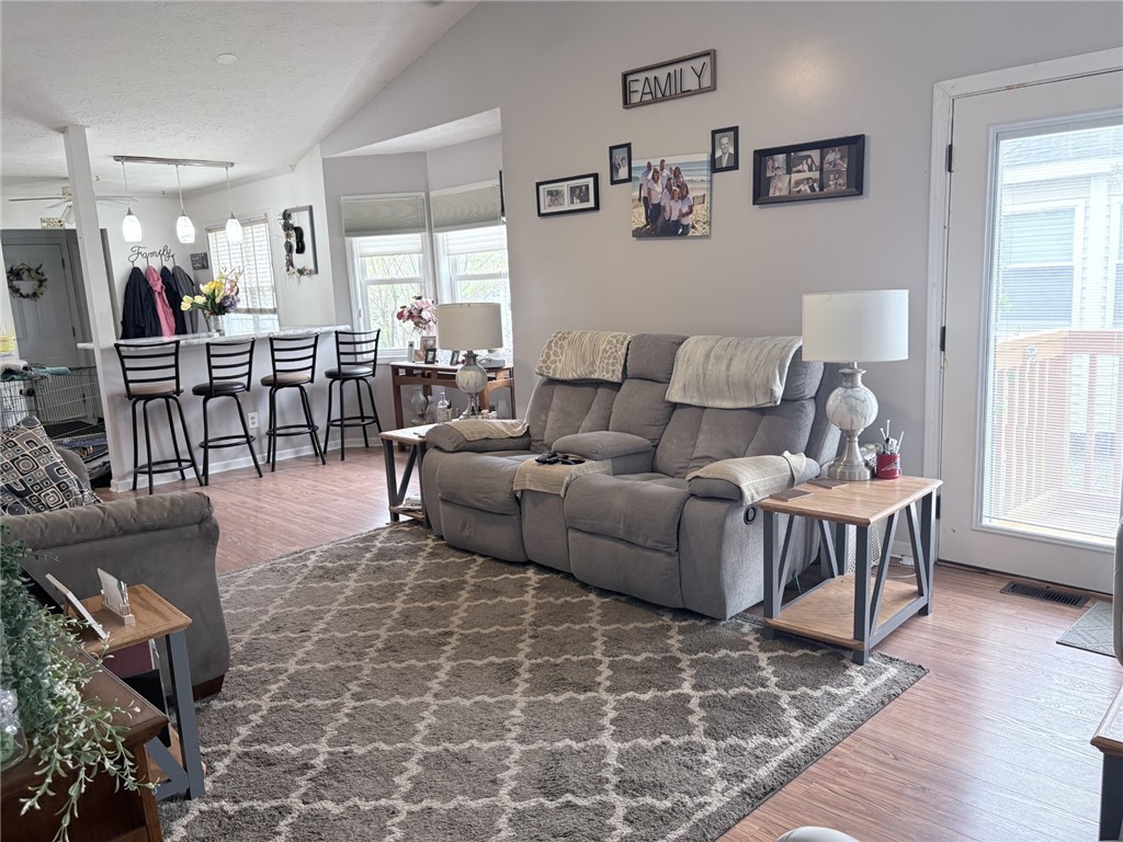 5740 Running Brook Road Farmington, NY 14425 - Photo 7 of 25 Living Room / Dining Area