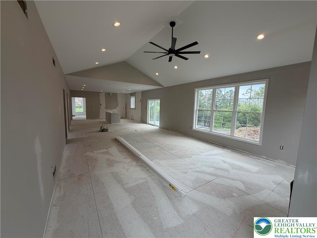 1899 Kecks Road Breinigsville, PA 18031 - Photo 28 of 30 This luminous interior space showcases high ceilings and ample natural light through large windows.
