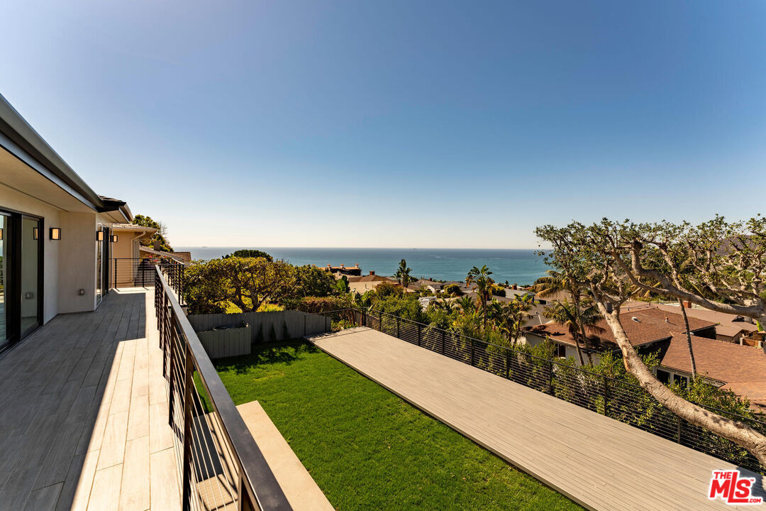 243 Notteargenta Road Pacific Palisades, CA 90272 - Photo 15 of 46 a view of a terrace with a garden