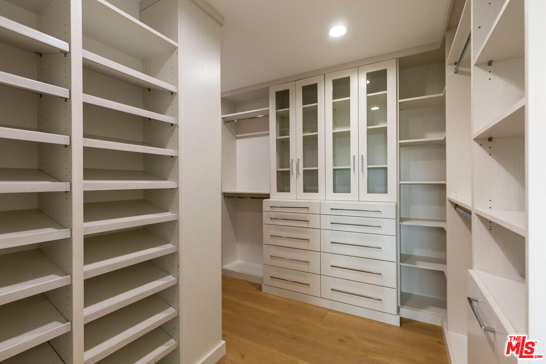 243 Notteargenta Road Pacific Palisades, CA 90272 - Photo 22 of 46 a view of an empty walk in closet