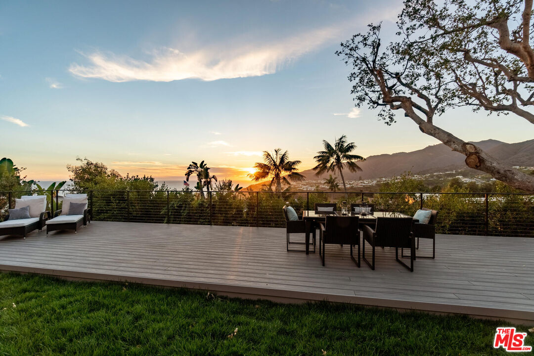 243 Notteargenta Road Pacific Palisades, CA 90272 - Photo 44 of 46 a view of a terrace with sitting area