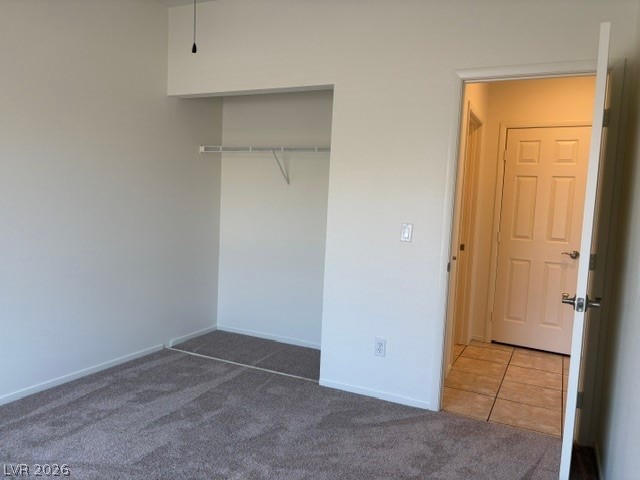 2866 Shimmering Bay Street Laughlin, NV 89029 - Photo 25 of 32 A well-lit bedroom provides comfortable carpeting and a convenient closet.
