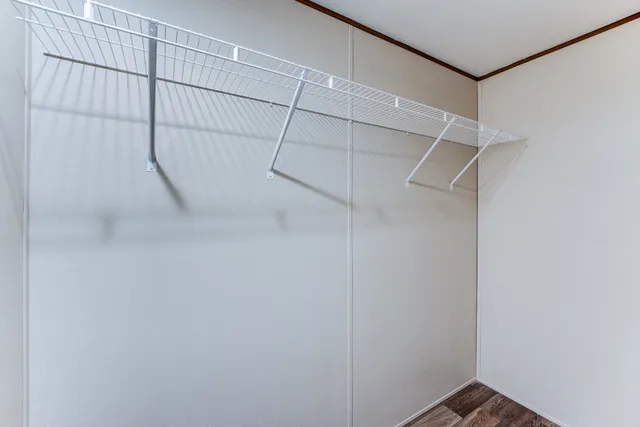 a view of a room with racks on the wall