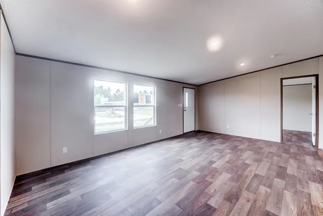 an empty room with windows