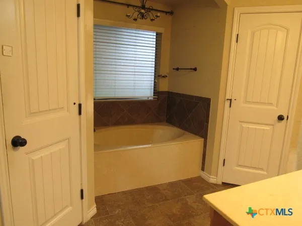a bathroom with a bathtub