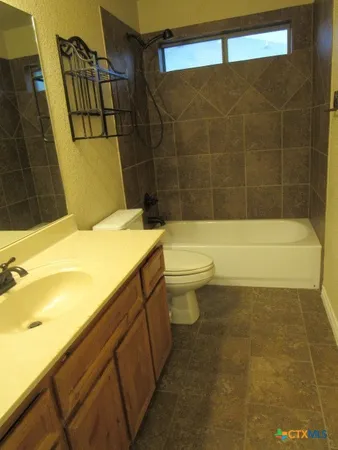 a bathroom with a sink and a bathtub