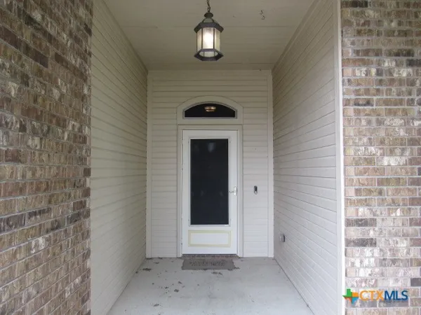 a view of an entryway of a house