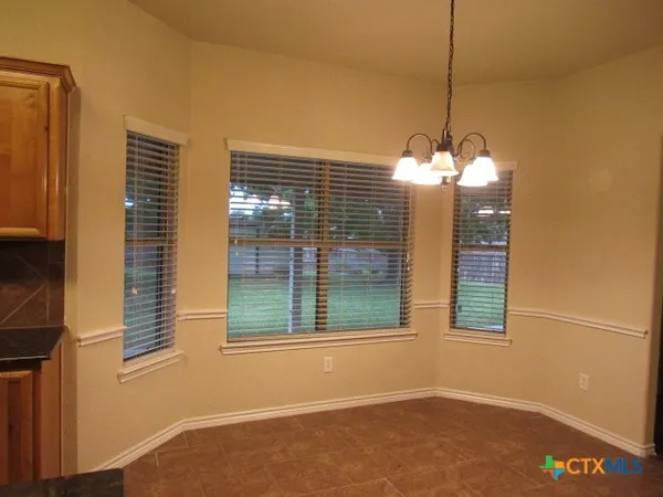 a view of a room with windows