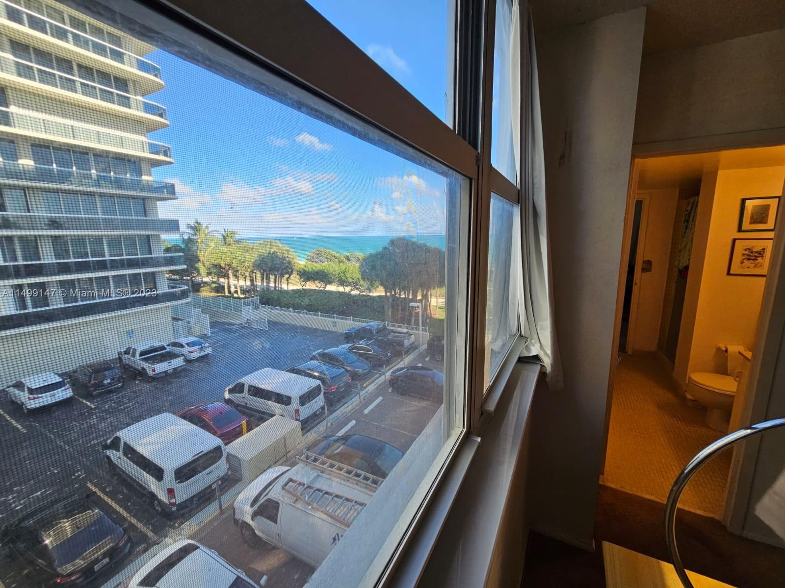 9511 Collins Avenue, Unit 403 Surfside, FL 33154 - Photo 18 of 52 a view of living room with furniture