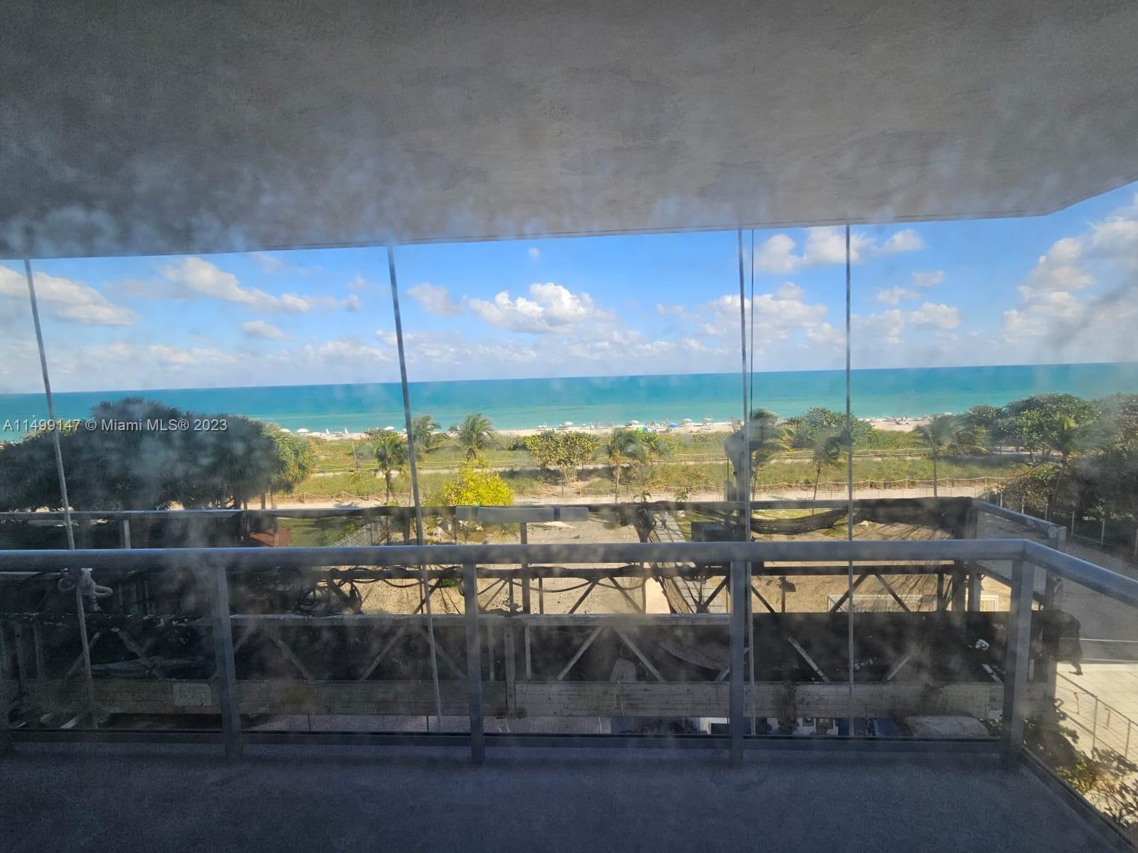 9511 Collins Avenue, Unit 403 Surfside, FL 33154 - Photo 21 of 52 a view of swimming pool from a balcony